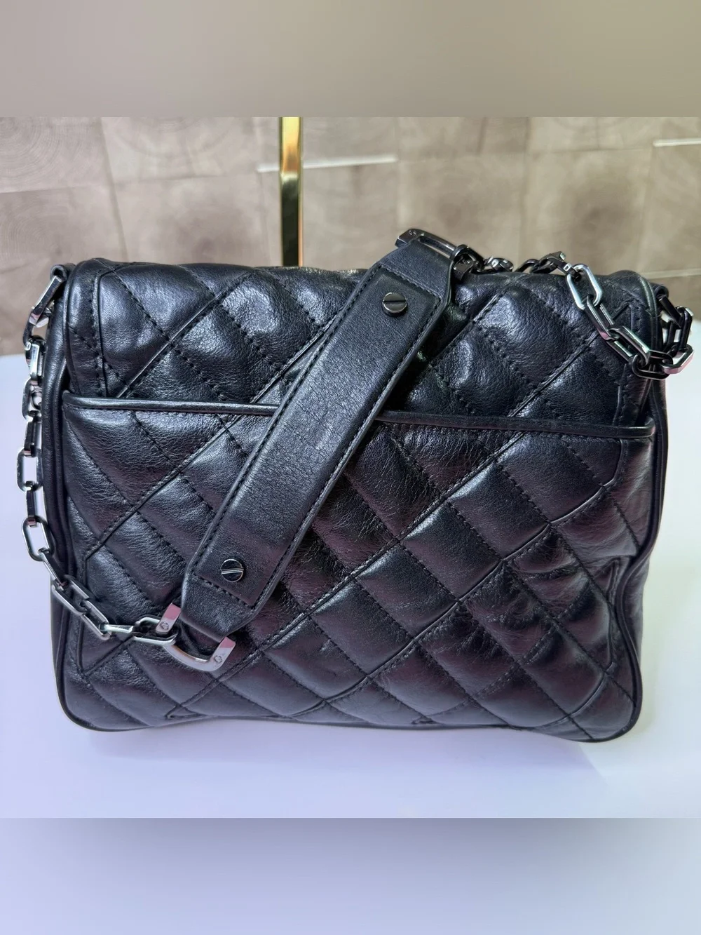 Tory Burch black quilted leather crossbody bag with chain strap